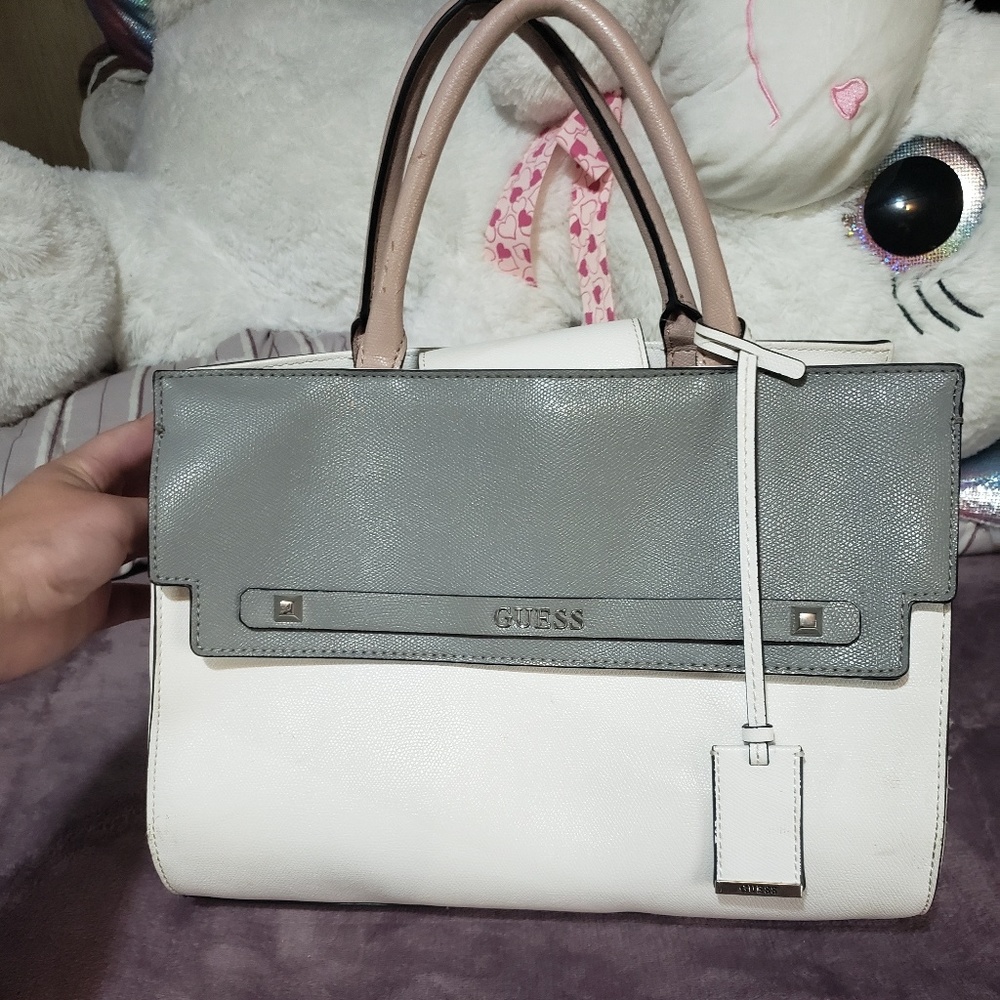 Guess grey, white, and mauve purse.